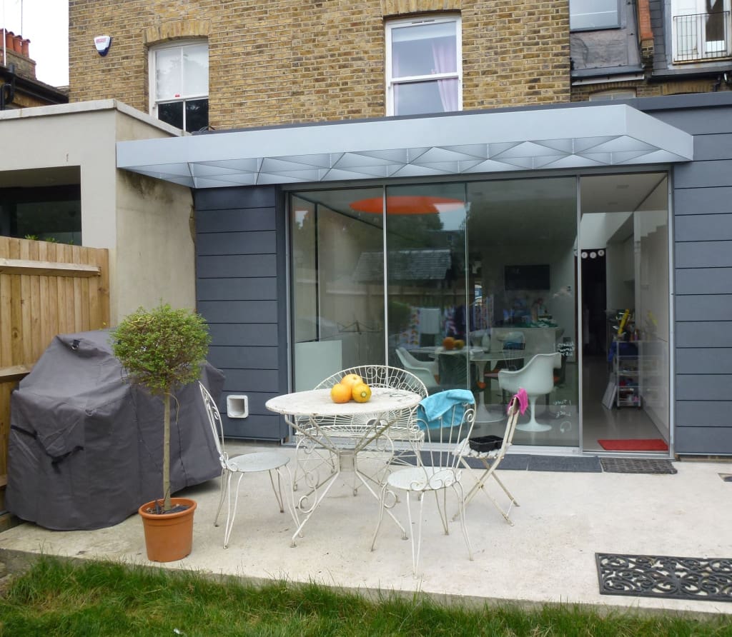 Residential extension gets cladding at last!